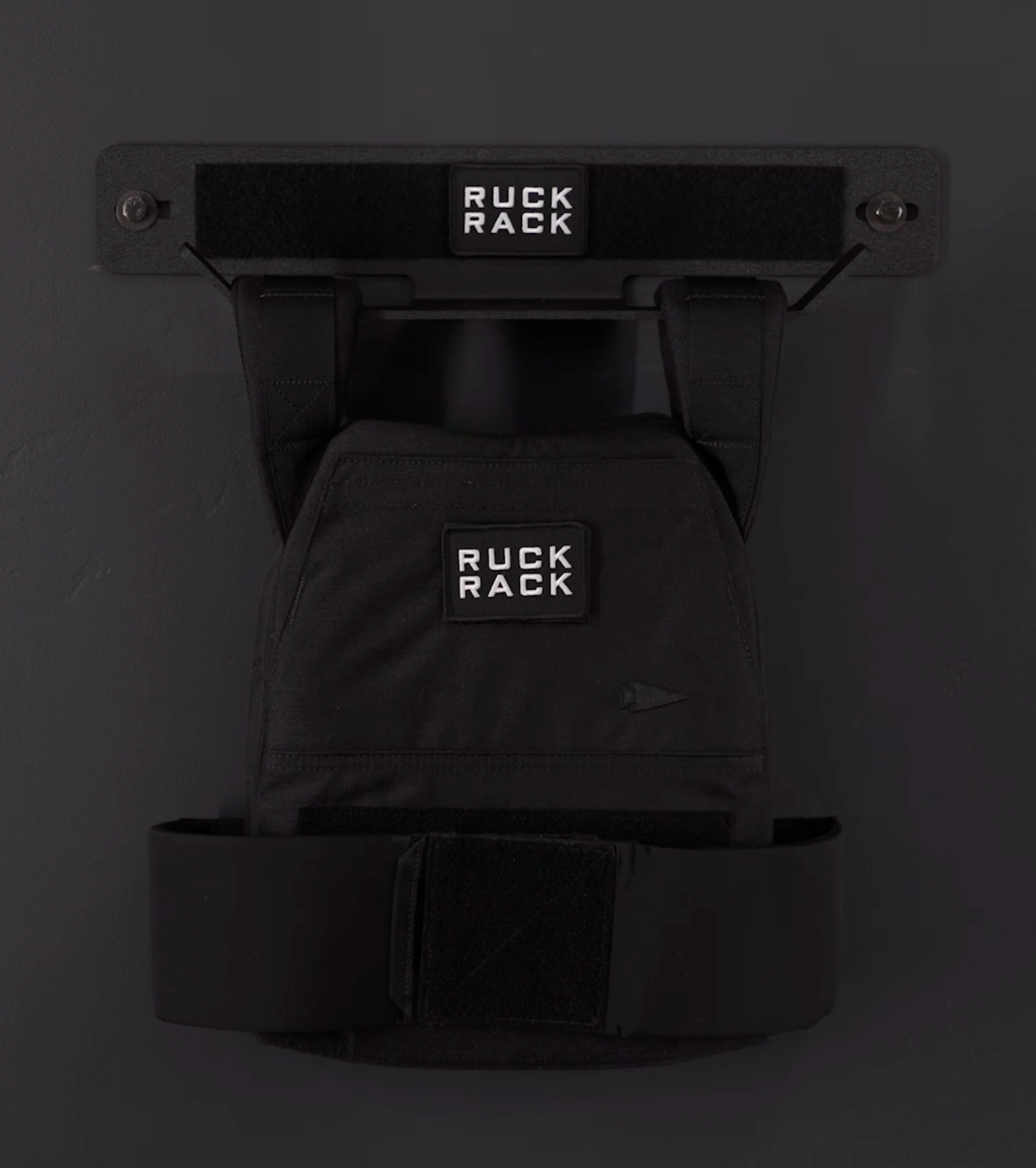 Black Ruck Rack product on a dark background storing weight vest