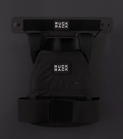 Black Ruck Rack product on a dark background storing weight vest